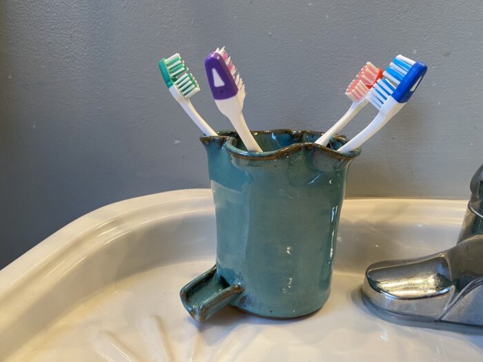 Teal Electric Toothbrush Holder